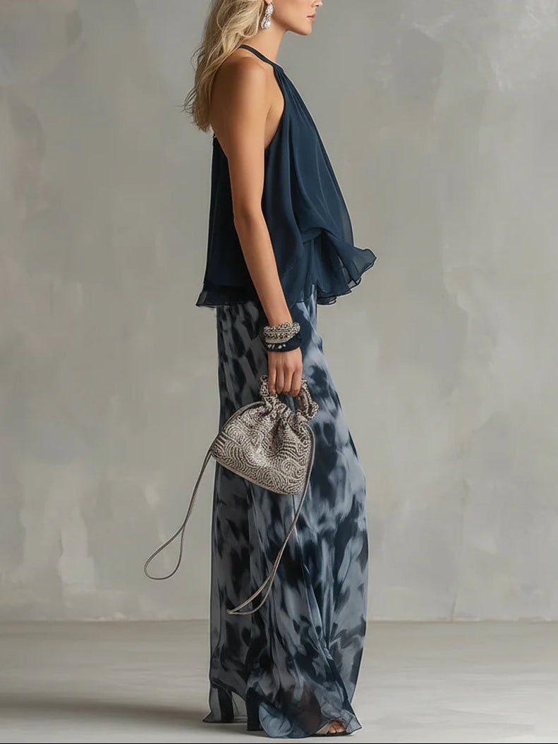 Top con collo all'americana navy e set di pantaloni larghi stampati in chiffon